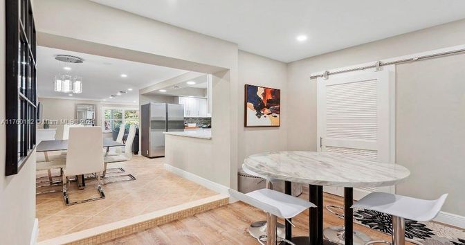Dining room, Interior, Kitchen, Pendant Lights, Recessed Lighting, Stainless Steel Appliances, Wood Texture Flooring