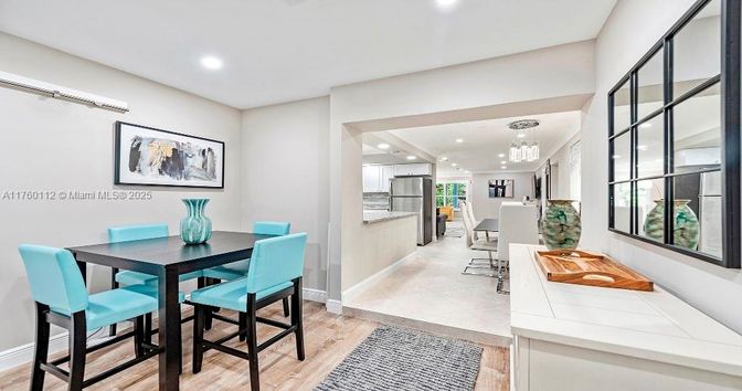 Dining room, Interior, Kitchen, Recessed Lighting, Stainless Steel Appliances, Wood Texture Flooring