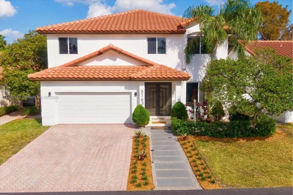 Attached, Exterior, Facade, Spanish Mediterranean