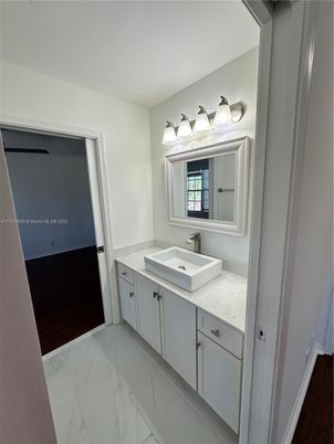 Bathroom, Dual Sink Vanities, Interior, Marble, Wood Texture Flooring