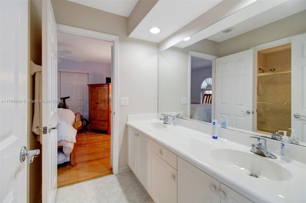 Bathroom, Dual Sink Vanities, Interior, Recessed Lighting, Wood Texture Flooring