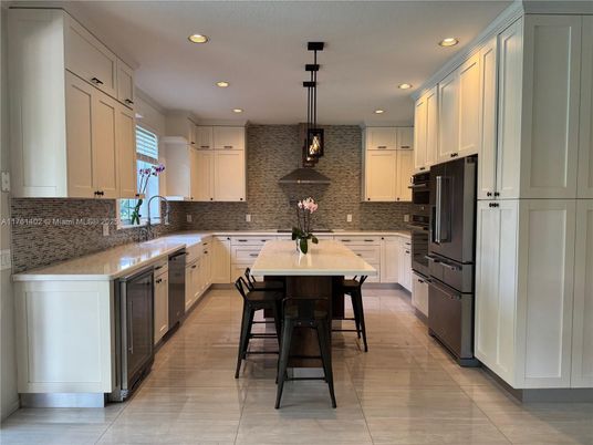 Interior, Kitchen, Pendant Lights, Recessed Lighting, Stainless Steel Appliances, Stone Walls