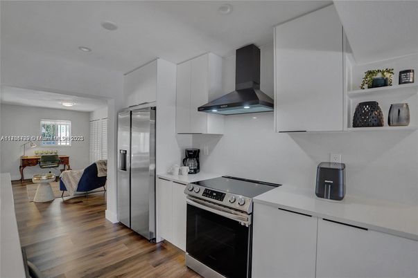 Interior, Kitchen, Recessed Lighting, Stainless Steel Appliances, Wood Texture Flooring