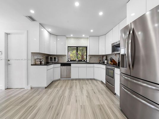 Interior, Kitchen, Recessed Lighting, Stainless Steel Appliances, Wood Texture Flooring