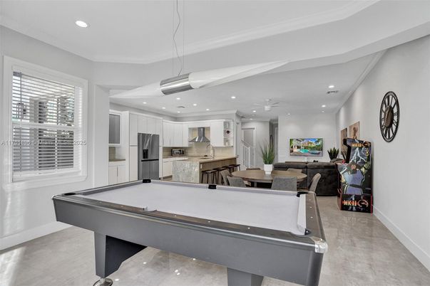 Billiard Table, Dining room, Game Room, Interior, Kitchen, Living room, Pendant Lights, Recessed Lighting, Stainless Steel Appliances