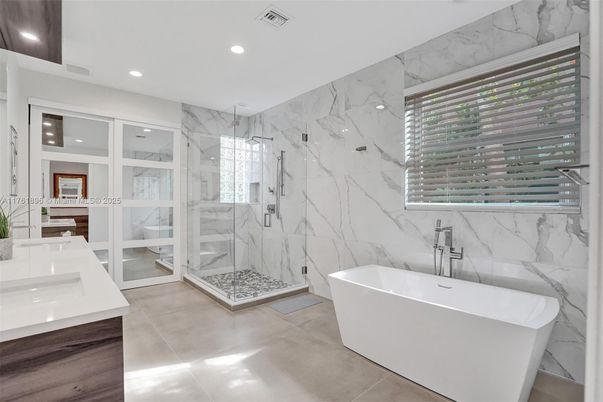 Bathroom, Free Standing Baths, Glass Shower, Interior, Marble Walls, Recessed Lighting