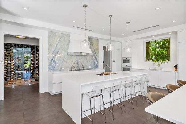 Interior, Kitchen, Marble Walls, Pendant Lights, Recessed Lighting, Stainless Steel Appliances, Wine Storage