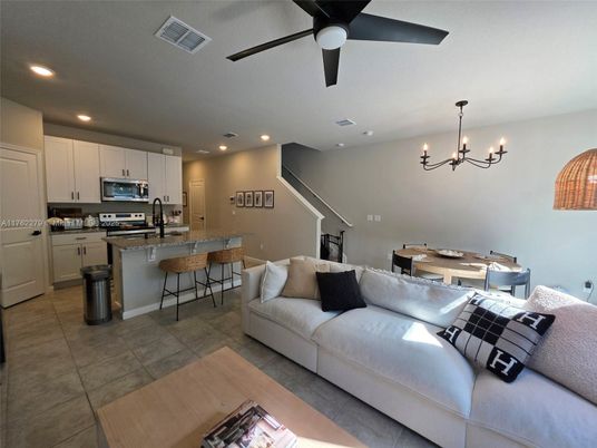 Chandelier, Dining room, Interior, Kitchen, Living room, Recessed Lighting, Stainless Steel Appliances