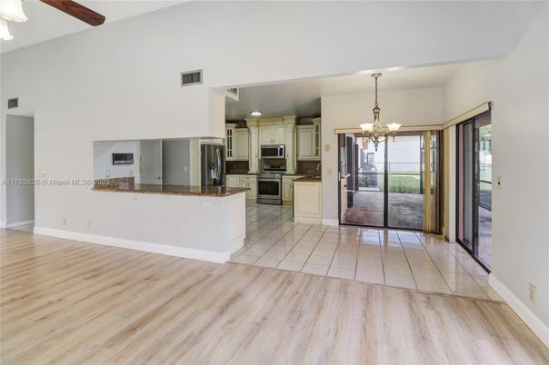 Chandelier, Empty room, Interior, Kitchen, Stainless Steel Appliances, Wood Texture Flooring