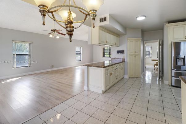 Chandelier, Empty room, Interior, Kitchen, Recessed Lighting, Wood Texture Flooring
