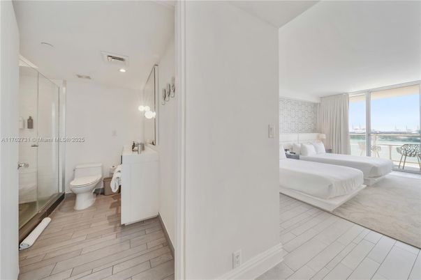 Bathroom, Bedroom, Glass Shower, Interior, Recessed Lighting, Wood Texture Flooring
