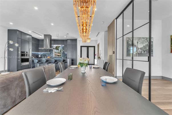 Chandelier, Dining room, Interior, Kitchen, Pendant Lights, Recessed Lighting, Stainless Steel Appliances, Wood Texture Flooring
