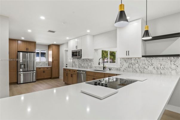 Interior, Kitchen, Pendant Lights, Recessed Lighting, Stainless Steel Appliances, Wood Texture Flooring