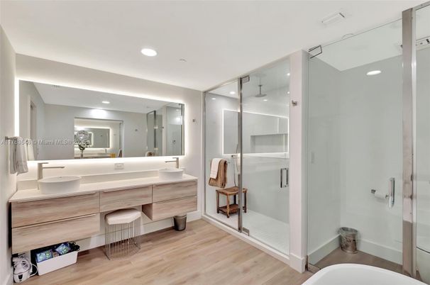 Bathroom, Dual Sink Vanities, Glass Shower, Interior, Recessed Lighting, Wood Texture Flooring