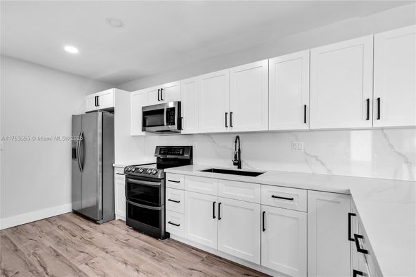 Interior, Kitchen, Marble Walls, Recessed Lighting, Wood Texture Flooring