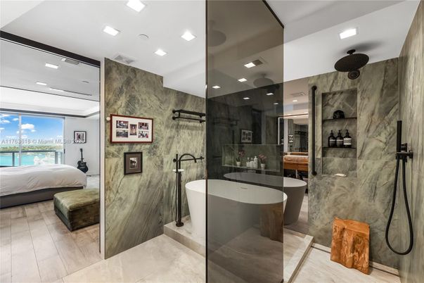 Bathroom, Bedroom, Free Standing Baths, Glass Shower, Interior, Marble Walls, Recessed Lighting