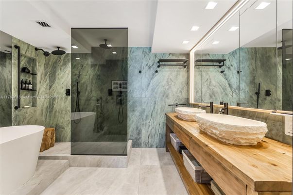 Bathroom, Dual Sink Vanities, Free Standing Baths, Glass Shower, Interior, Marble Walls, Recessed Lighting