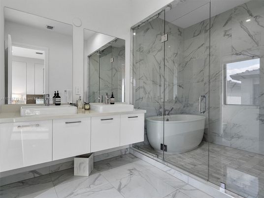 Bathroom, Dual Sink Vanities, Free Standing Baths, Glass Shower, Interior, Marble, Marble Walls