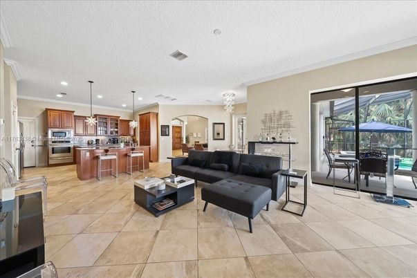 Chandelier, Dining room, Interior, Kitchen, Living room, Pendant Lights, Recessed Lighting, Stainless Steel Appliances