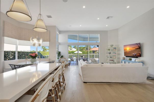 Dining room, Fireplace, Interior, Living room, Pendant Lights, Recessed Lighting, Wood Texture Flooring