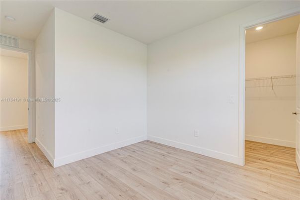 Empty room, Interior, Recessed Lighting, Walk-in Closets, Wood Texture Flooring
