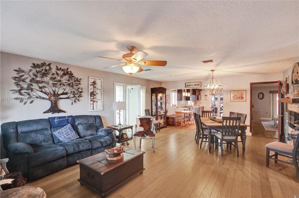 Chandelier, Dining room, Fireplace, Interior, Living room, Wood Texture Flooring
