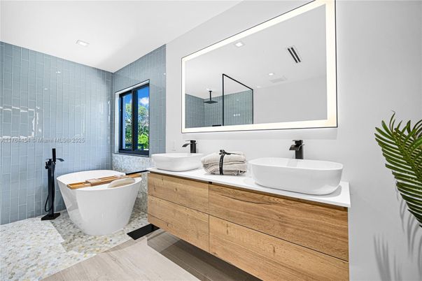 Bathroom, Dual Sink Vanities, Free Standing Baths, Interior, Recessed Lighting, Wood Texture Flooring