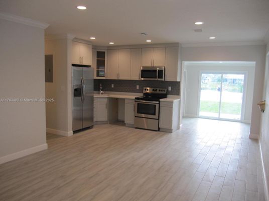 Interior, Kitchen, Recessed Lighting, Stainless Steel Appliances, Wood Texture Flooring