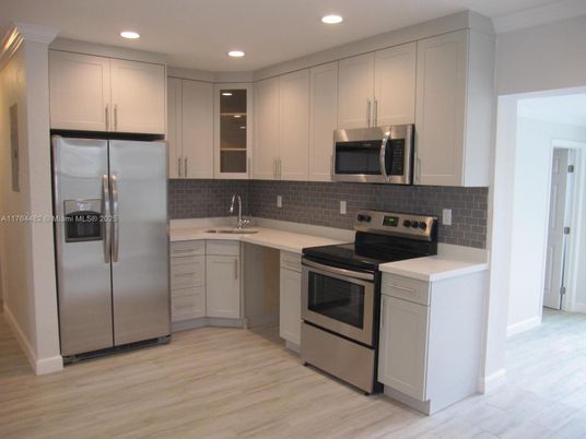 Interior, Kitchen, Recessed Lighting, Stainless Steel Appliances, Wood Texture Flooring