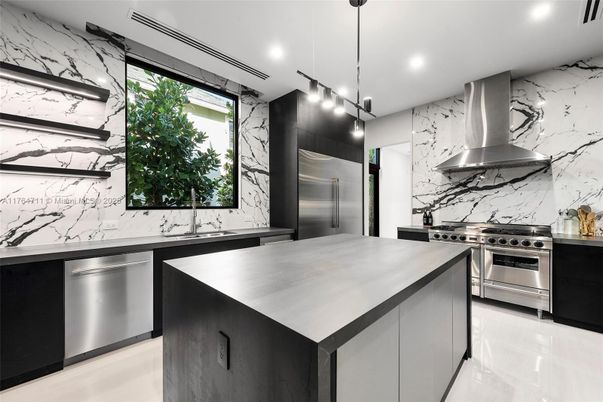 Interior, Kitchen, Marble Walls, Pendant Lights, Recessed Lighting, Stainless Steel Appliances