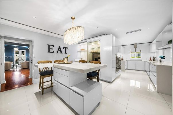Chandelier, Interior, Kitchen, Living room, Recessed Lighting, Stainless Steel Appliances, Wood Texture Flooring