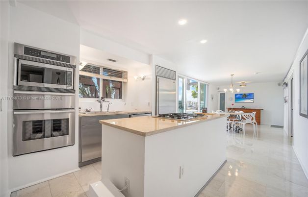 Chandelier, Dining room, Interior, Kitchen, Pendant Lights, Recessed Lighting, Stainless Steel Appliances