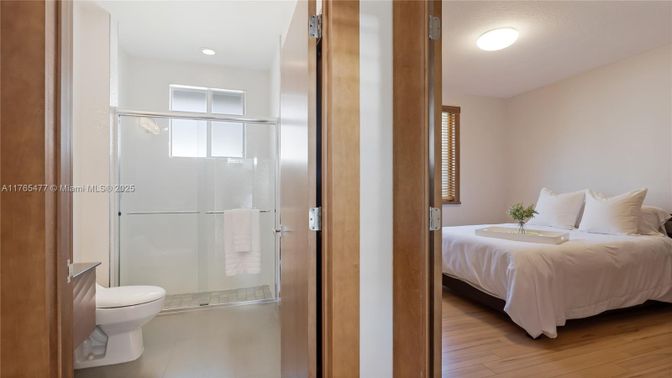Bathroom, Bedroom, Glass Shower, Interior, Recessed Lighting, Wood Texture Flooring