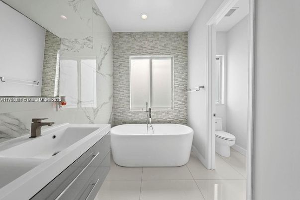 Bathroom, Free Standing Baths, Interior, Marble Walls, Recessed Lighting