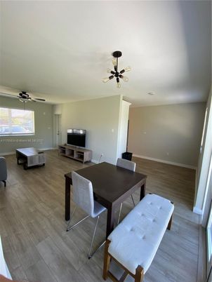 Dining room, Interior, Living room, Pendant Lights, Wood Texture Flooring