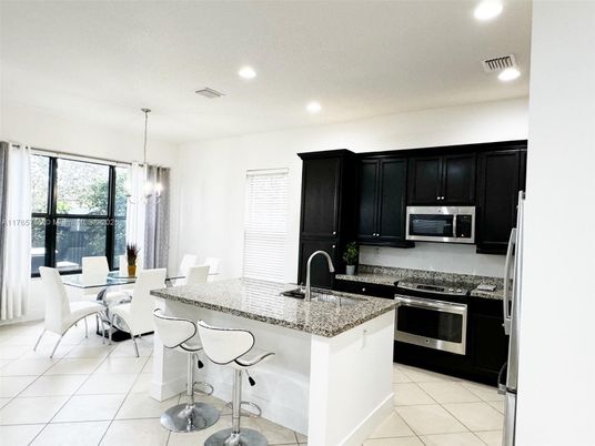 Dining room, Interior, Kitchen, Pendant Lights, Recessed Lighting, Stainless Steel Appliances