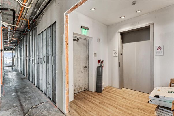 Elevator, Interior, Recessed Lighting, Wood Texture Flooring