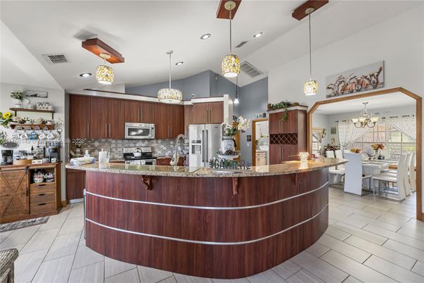 Chandelier, Dining room, Interior, Kitchen, Pendant Lights, Recessed Lighting, Stainless Steel Appliances