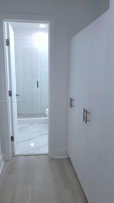Bathroom, Glass Shower, Interior, Marble, Marble Walls, Wood Texture Flooring