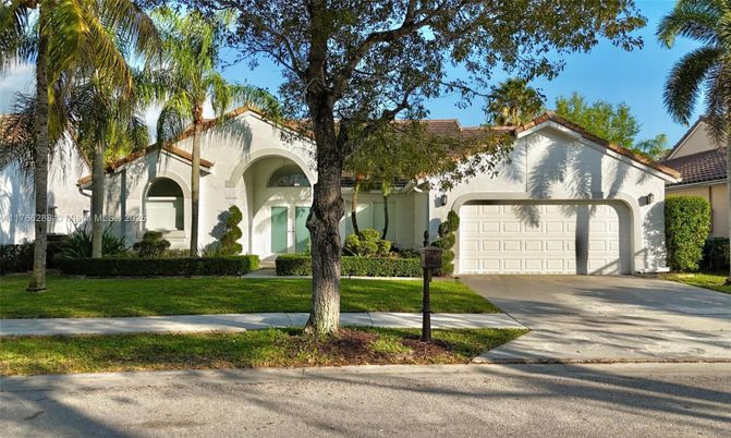 Attached, Exterior, Facade, Spanish Mediterranean