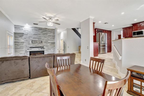 Dining room, Fireplace, Interior, Kitchen, Recessed Lighting, Stainless Steel Appliances, Stone Walls