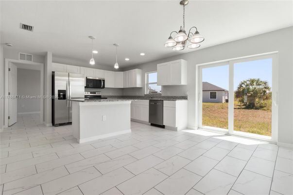 Interior, Kitchen, Marble, Pendant Lights, Recessed Lighting, Stainless Steel Appliances