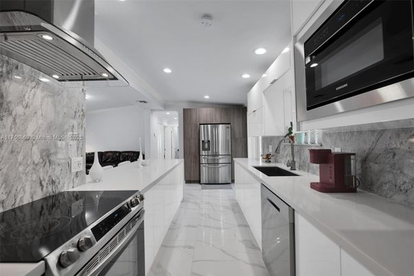 Interior, Kitchen, Marble, Marble Walls, Recessed Lighting, Stainless Steel Appliances