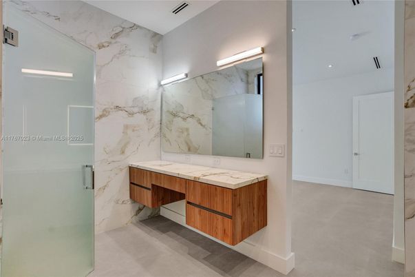 Bathroom, Dual Sink Vanities, Interior, Marble Walls, Recessed Lighting