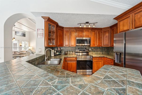 Interior, Kitchen, Stainless Steel Appliances, Tile Countertops