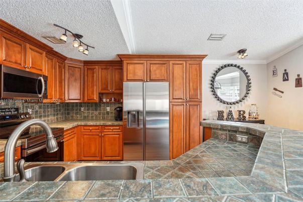 Interior, Kitchen, Stainless Steel Appliances, Tile Countertops