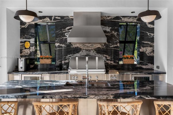 Interior, Kitchen, Marble Walls, Pendant Lights, Stainless Steel Appliances