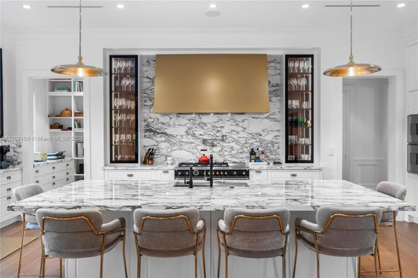 Interior, Kitchen, Marble Walls, Pendant Lights, Recessed Lighting, Stainless Steel Appliances, Wood Texture Flooring