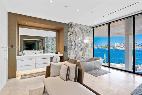 Bathroom, Dual Sink Vanities, Free Standing Baths, Interior, Marble, Marble Walls, Recessed Lighting, Water