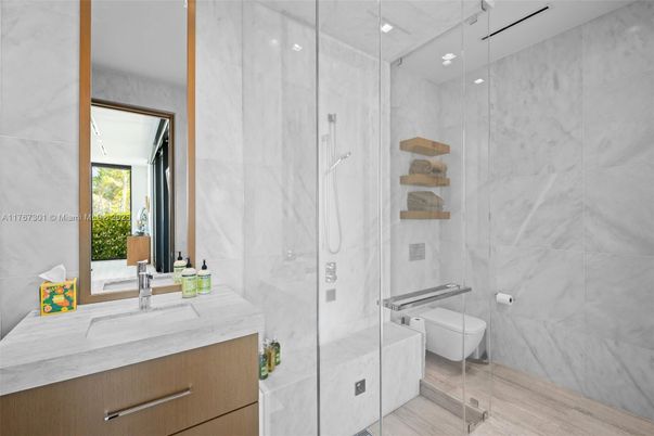 Bathroom, Glass Shower, Interior, Marble Walls, Wood Texture Flooring